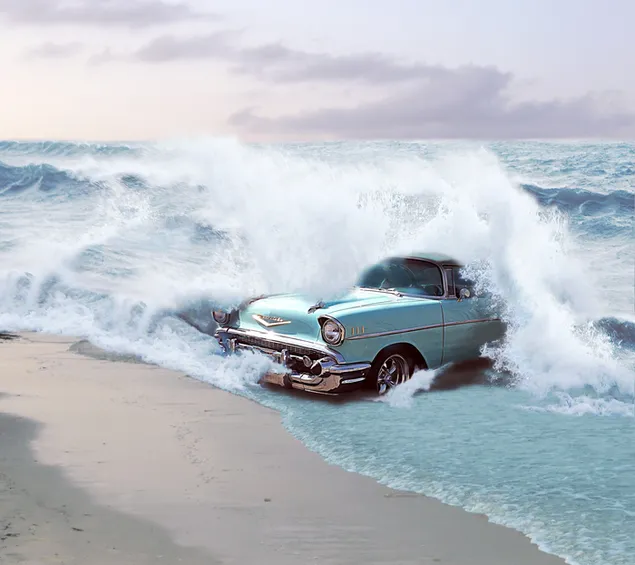 1957年海の波に覆われたターコイズ色のシボレーベルエア