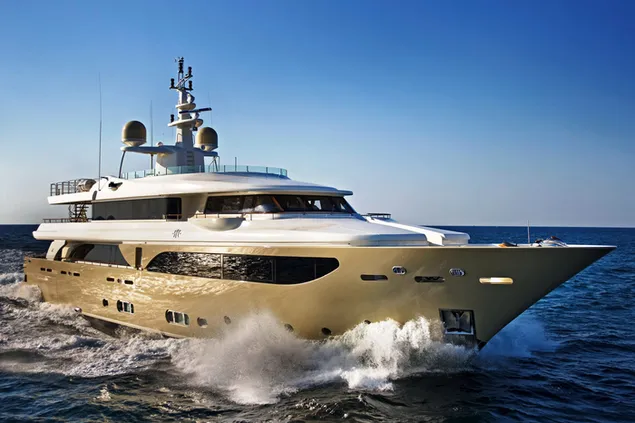 A super yacht in a view of sea foam and blue skies download