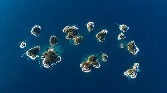 aerial view of verdant islands in deep blue ocean download