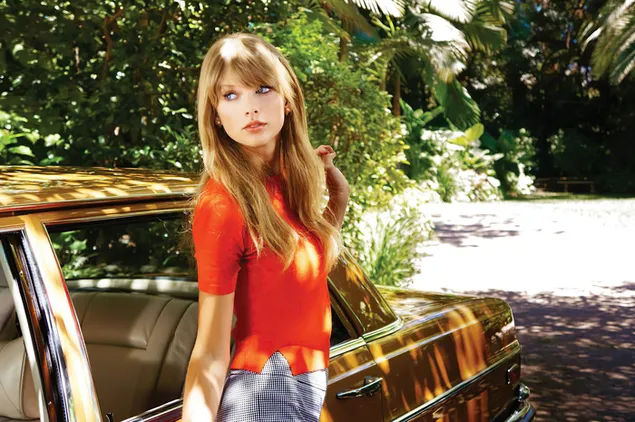 American blonde beautiful singer Taylor Alison Swift near the classic car 4K wallpaper