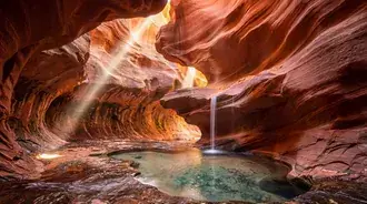 antelope canyon magic: light beams, waterfall & serene pool download