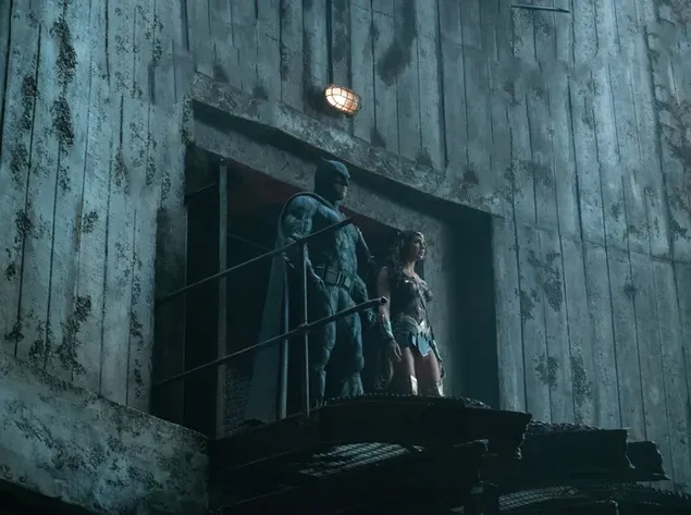 betmen i divo-zhinka stoyat' na zlamanomu mostu zavantazhiti