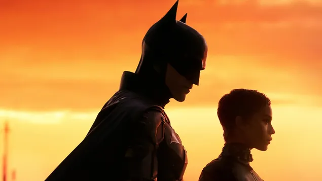 バットマン：日の出のバットマンとキャットウーマン