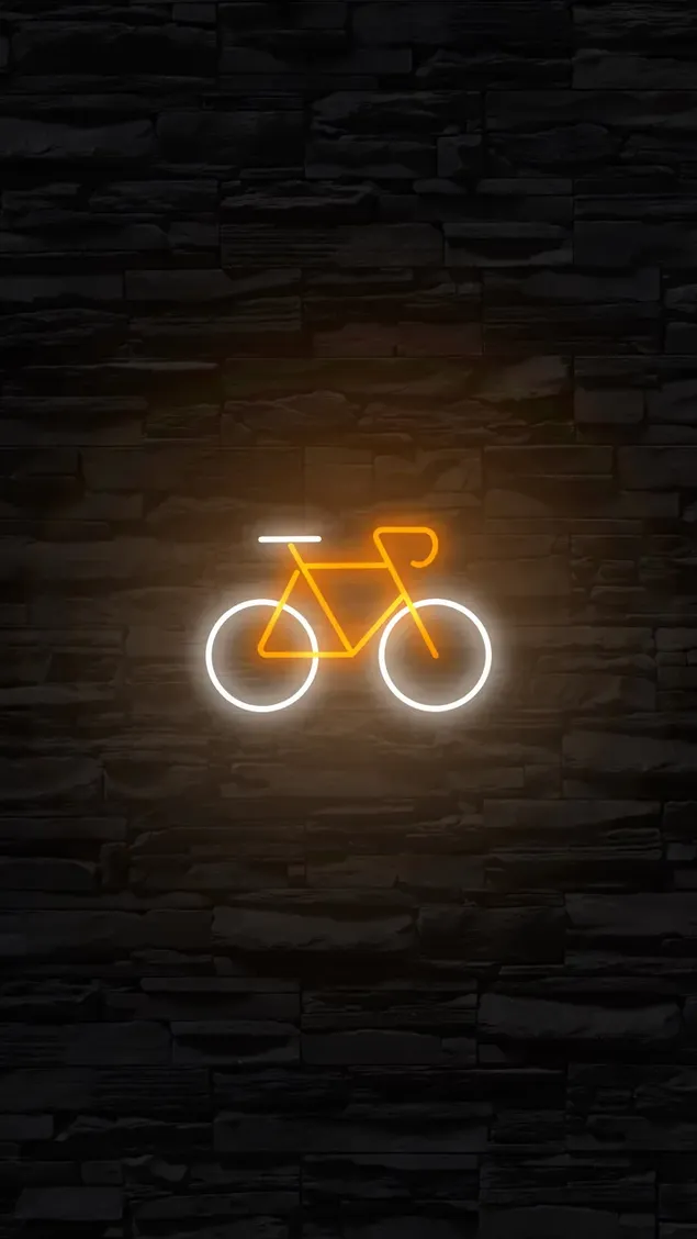 Bicicleta diseñada con luces naranjas y blancas frente a una pared de ladrillos