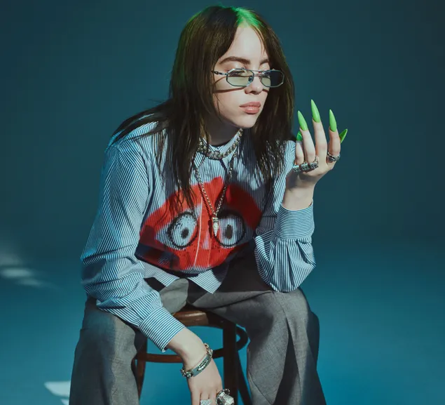 Billie Eilish poserer med grønne neglelakbriller 4K tapet