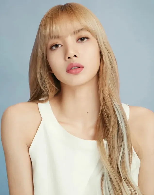 Blackpink girl group member Lalisa looks charming in a white dress and blonde hair