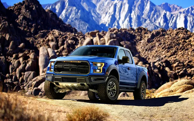 Blue, black hood, Ford Ranger pickup truck parked on a dirt road in the cliffs 2K wallpaper
