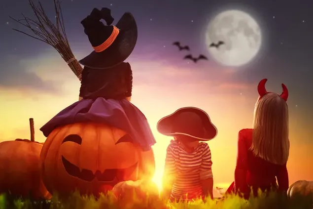 jong a meedchen droen monster kostum mat jack-o'-lantern eroflueden