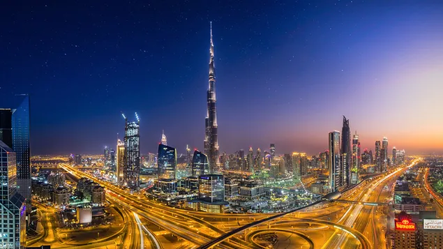 Jalan raya Dubai yang sibuk di fotografi malam hari unduhan