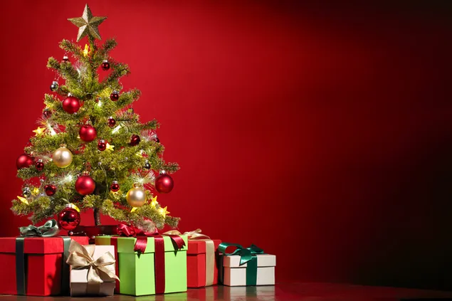 Pino navideño y cajas de regalo. descargar