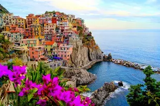 Cinque Terre - Seaside flowers and city 4K wallpaper