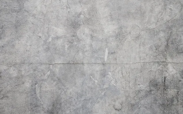 Foto en primer plano de una pared de hormigón gris, grietas, cemento, arañazos