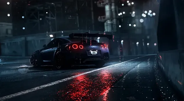 Coche de carreras Nissan gt-r parado en una carretera asfaltada con reflejo de las luces de la ciudad por la noche cuando llueve descargar