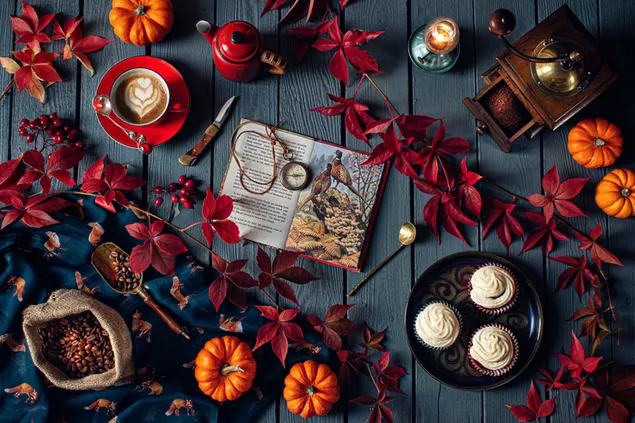 Concepto creativo de otoño para Halloween con café, pastelitos, calabaza y libros