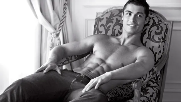 Cristiano showing his hot body while sit on chair 4K wallpaper