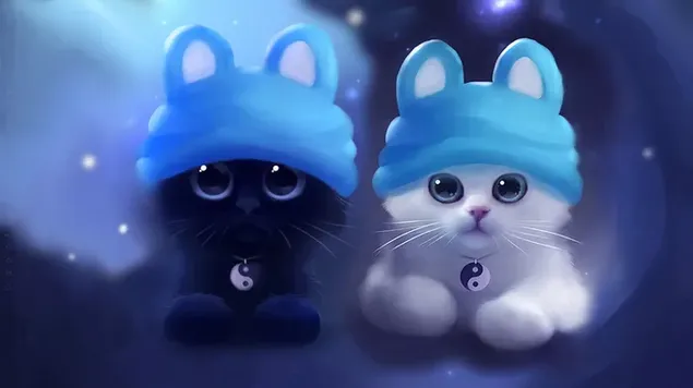 Leuke poses van zwart-witte kittens in mai-hoeden op blauwe toonachtergrond