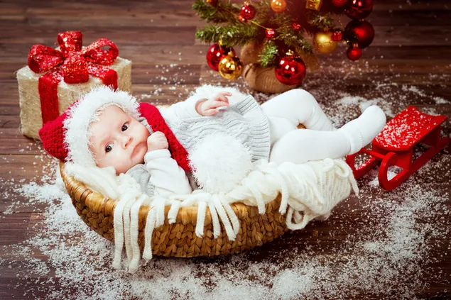 Das süßeste Weihnachtsbaby aller Zeiten! 4K Hintergrundbild