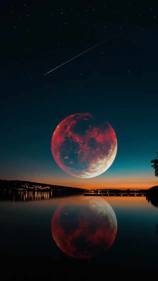 De weerspiegeling van de vallende ster en volle maan op het water in al hun schoonheid bij schemering download