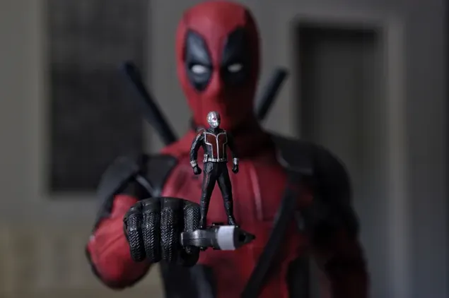 Páipéar balla Deadpool Ag Caochadán Antman Ina Lámh4K