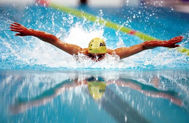 Die Hartnäckigkeit des Athleten aus dem Schwimm-Meisterschaftskampf herunterladen
