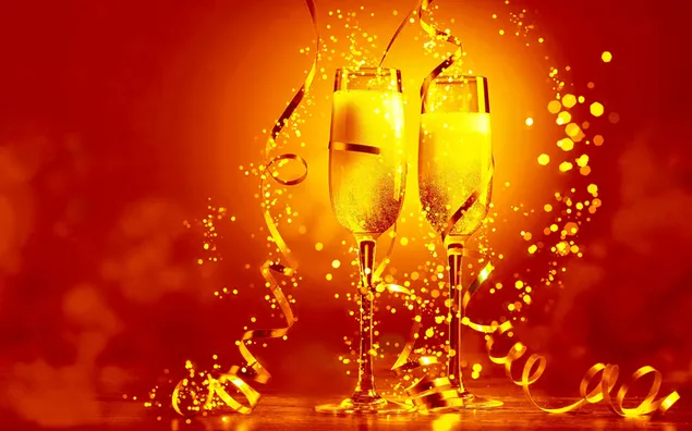 Drinking glasses prepared for the New Year celebration in front of a red orange background 2K wallpaper