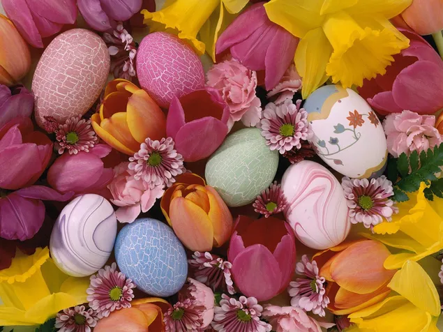 Fiesta de Pascua con coloridos huevos y flores. descargar