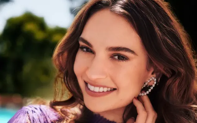 Famous English actress Lily James charming smile 