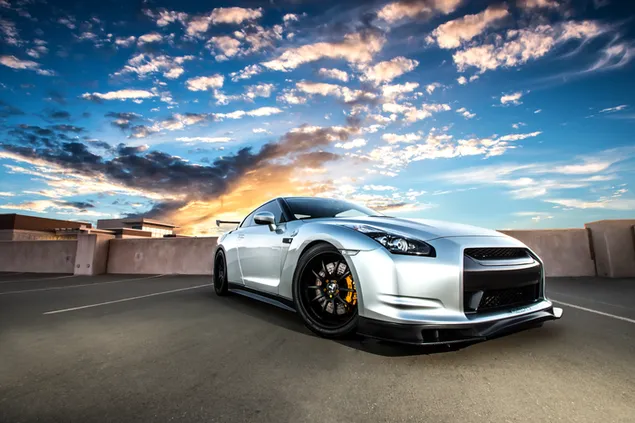 Fast and marvelous design nissan on asphalt road in sunny cloudy weather 4K wallpaper