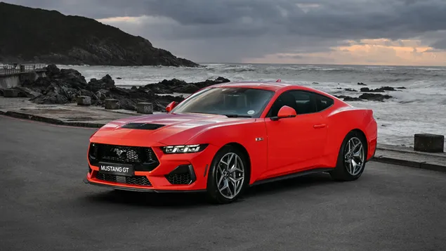 ford mustang gt uz more sa svojom crvenom bojom i sjajnim izgledom preuzmi