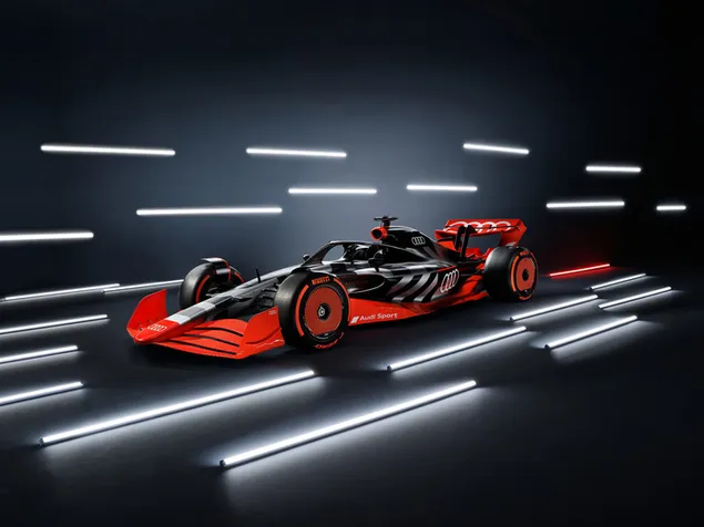 Coche de carreras rojo negro de Fórmula 1 en el área iluminada