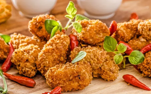 ocvrta piscancja krila z rdeco papriko prenos