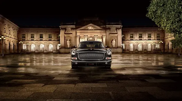 Vooraansig van 'n swart Hongqi L5-park voor 'n kasteel 6K muurpapier