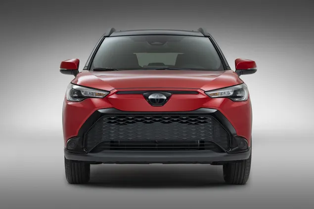 מבט קדמי של Toyota Corolla Cross Hybrid SE עם גלגלי פלדה אדומים בעיצוב מודרני 8K טפט