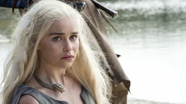 Game of Thrones star actress emily clarke, with her blonde hair and beautiful eyes, with her baby dragon
