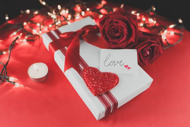 Gift and red roses for love with fairy lights 4K wallpaper
