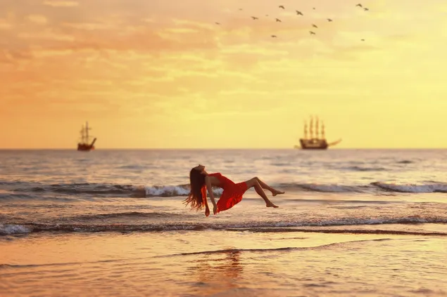 Vajza që rri pezull mbi oqean 2K sfond