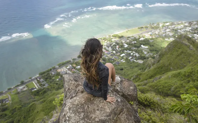Girl sitting on the cliff 2K wallpaper