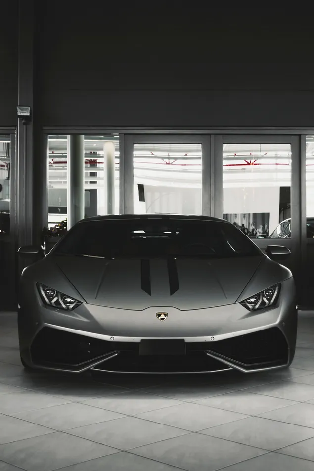 Gray Lamborghini coupe on parking area