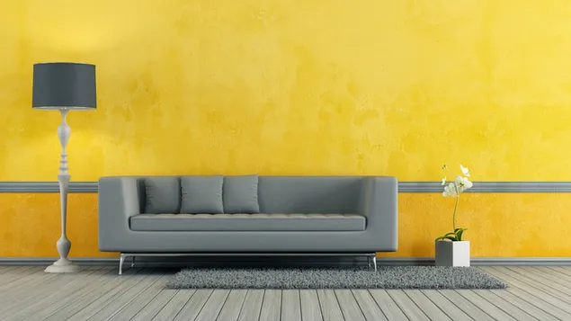 Sofá gris pared pintada de amarillo 4K fondo de pantalla