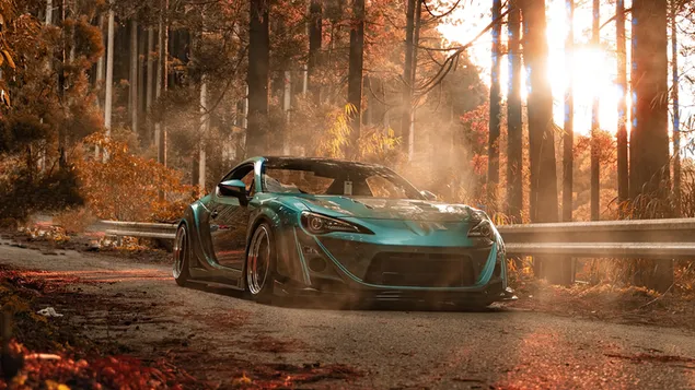 Grüner Toyota Supra auf bewaldeter Straße 4K Hintergrundbild