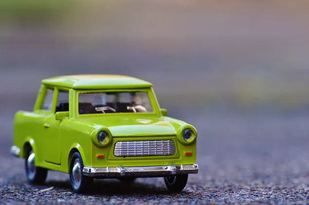 Groene Trabant auto miniatuur 4K achtergrond