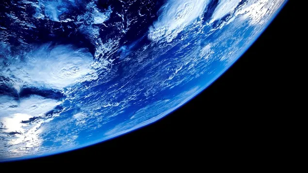 Medio primer plano de la tierra desde el espacio en la oscuridad 4K fondo de pantalla