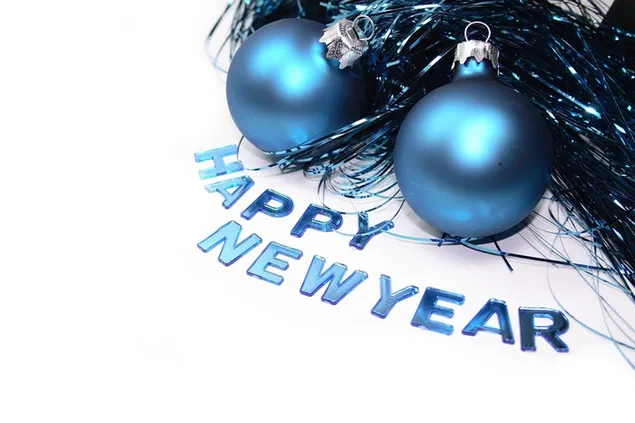 Happy new year glassy letters and blue ornaments