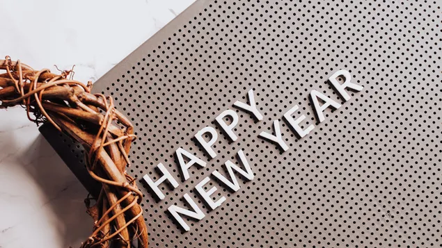 stastny novy rok textova zprava vedle hnedeho vence stahnout