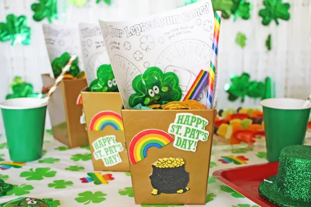 Happy St. Patrick's Day celebration with Four-leaf clover, cards and green cups