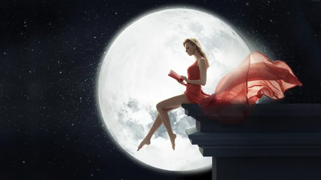 Hermosa mujer vestida de rojo sentada leyendo un libro bajo las magníficas luces de la luna llena