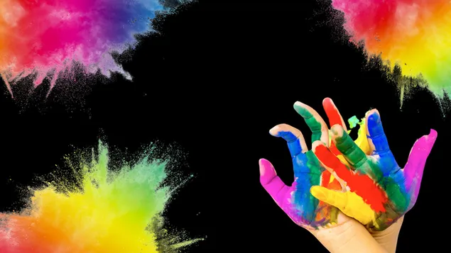 Holi-festival, geschilderde handen en plons van kleuren op zwarte achtergrond download