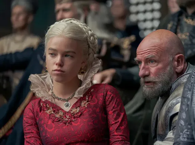 House of the Dragon Rhaenyra Targaryen en vestido rojo real con su guardia personal descargar