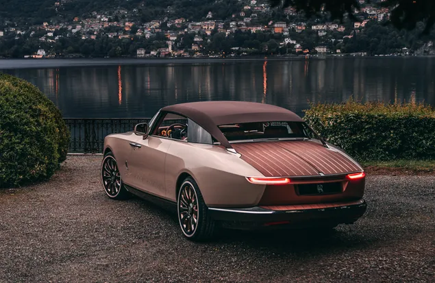 Legendariese Rolls Royce omskepbare, bruinkleurige 4K muurpapier