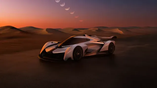 Mclaren Sportsauto geparkt an der Wüst mat Hallefmound Vue bei Sonnenënnergang HD Tapeten